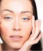 A woman showcasing the benefits of Tixel Skin Tightening, which smooths fine lines, lifts sagging skin, and refreshes the face, especially around the eyes.