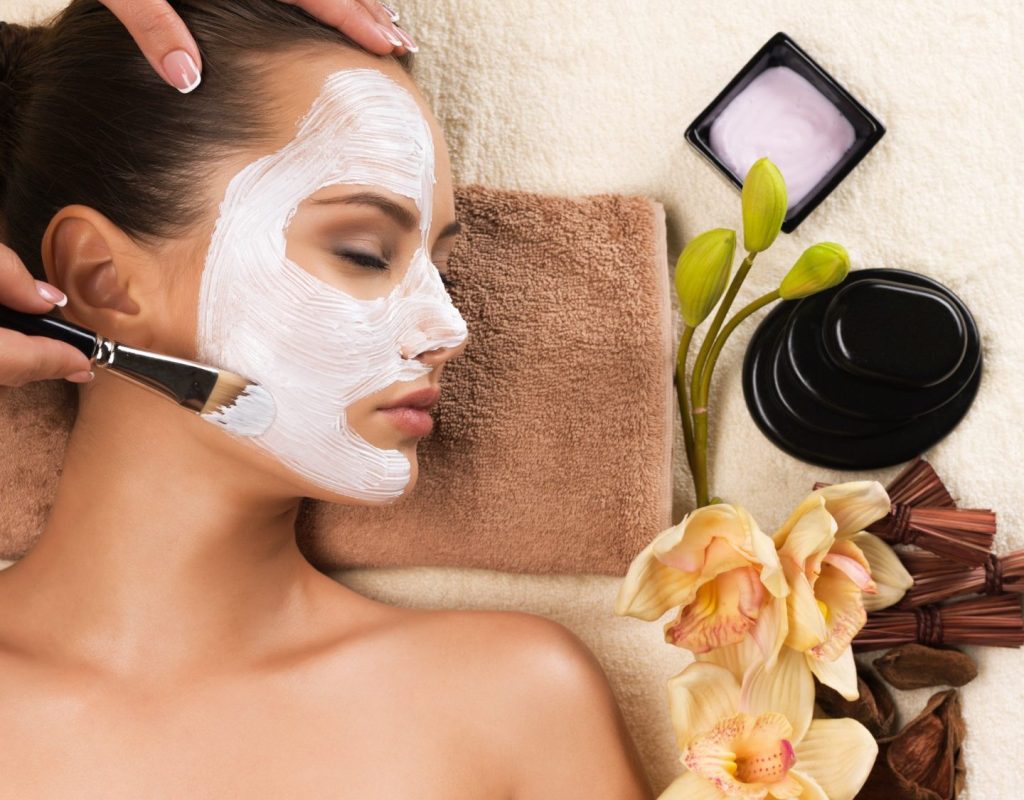 woman-having-a-facial-cosmetic-mask-at-spa-salon-e1672052311383.jpg