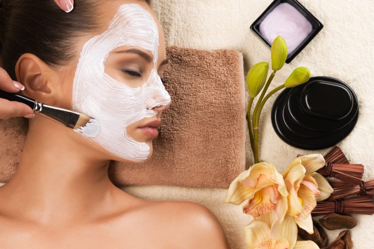 woman-having-a-facial-cosmetic-mask-at-spa-salon-e1672052311383.jpg